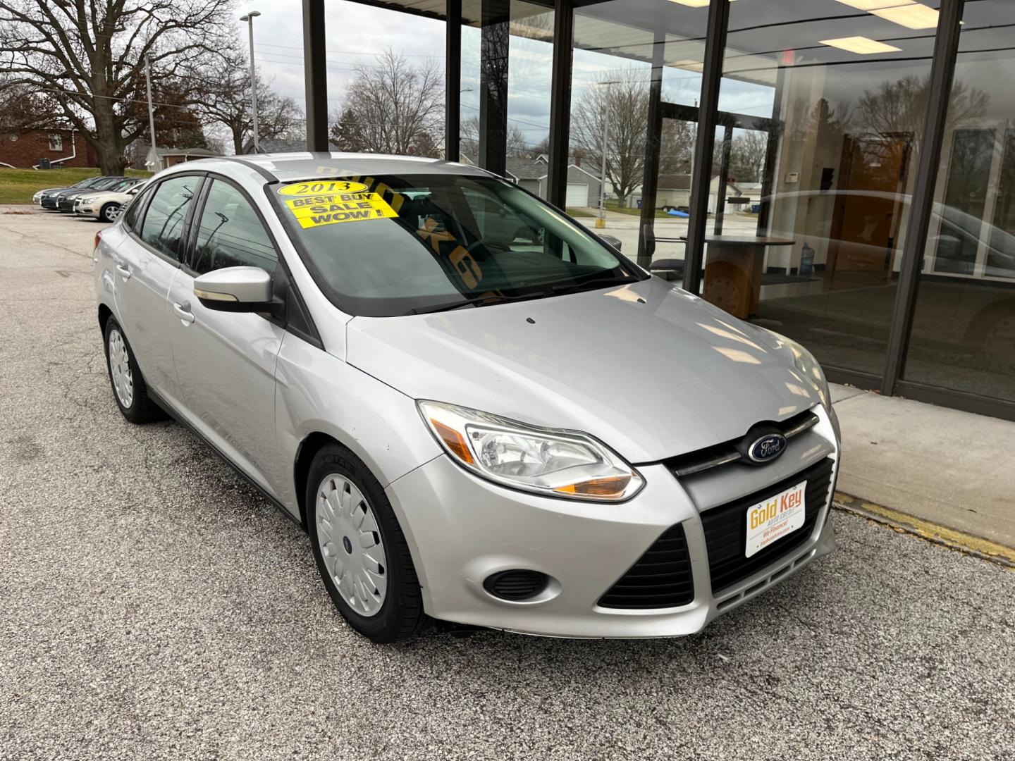 2013 Ingot Silver Metalli Ford Focus SE Sedan (1FADP3F28DL) with an 2.0L L4 DOHC 16V engine, located at 1633 W Kimberly, Davenport, IA, 52806, (563) 323-5341, 41.559456, -90.598732 - Photo#2